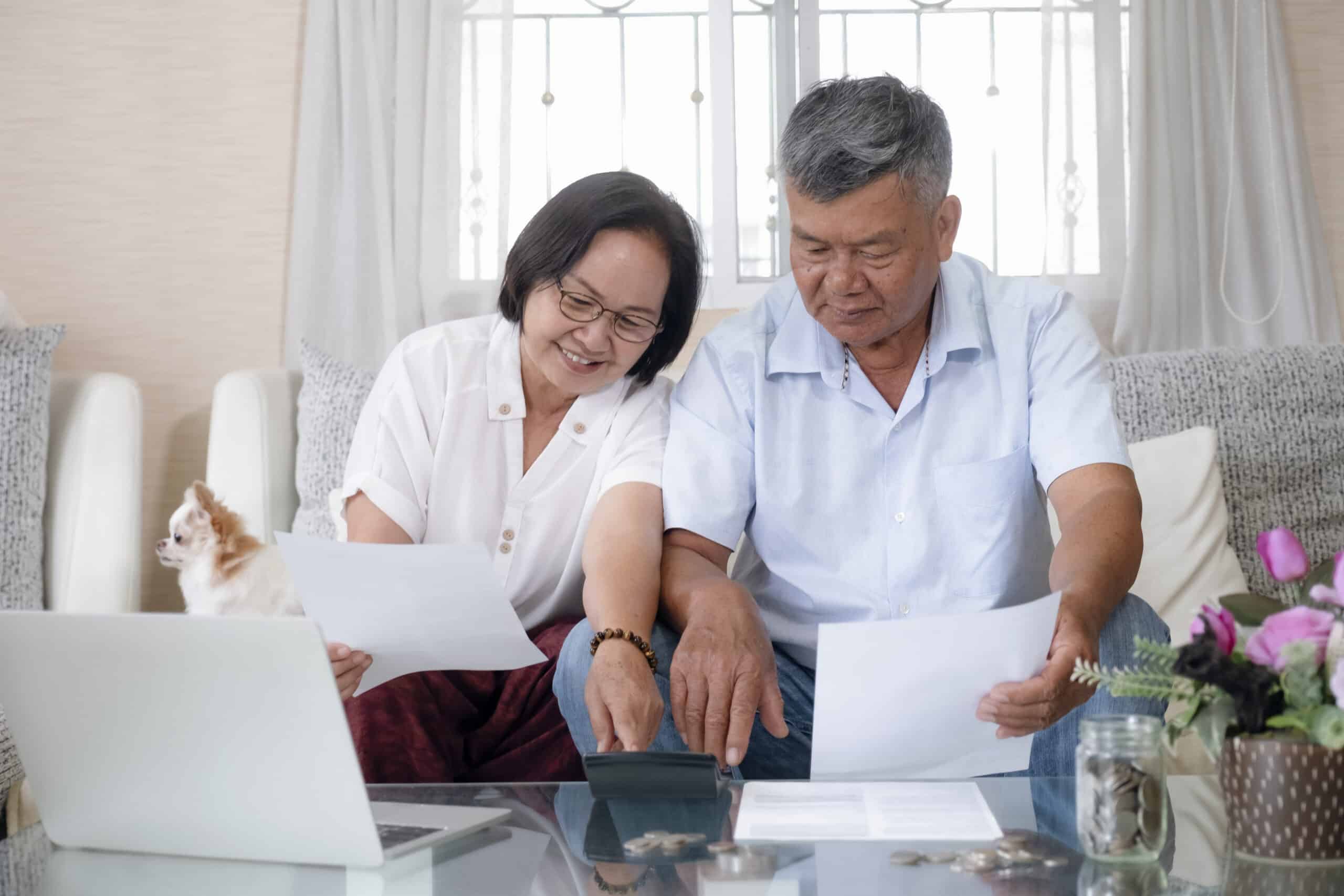 Asian senior couple doing and calculating home finances. Retriement planning.