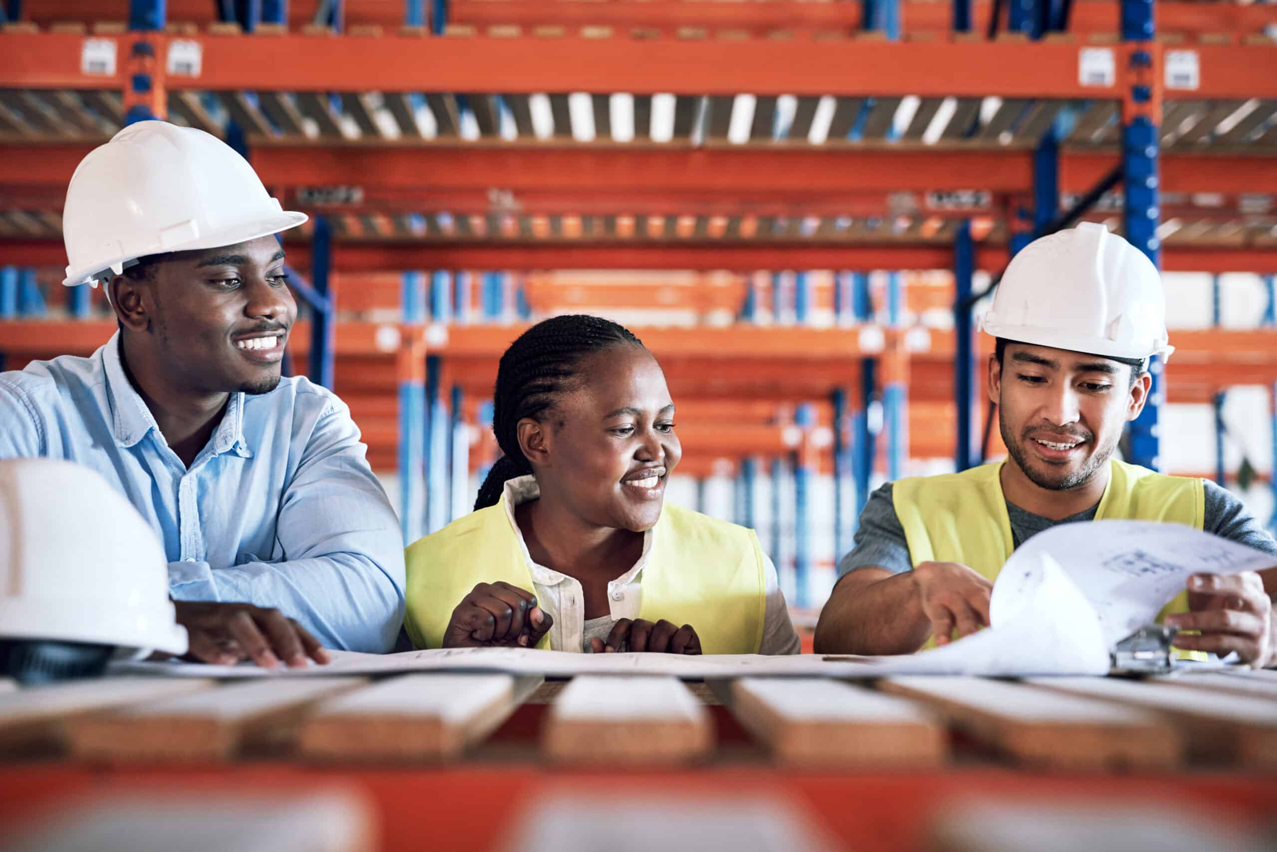 Shot of a group of builders having a meeting at a construction site.